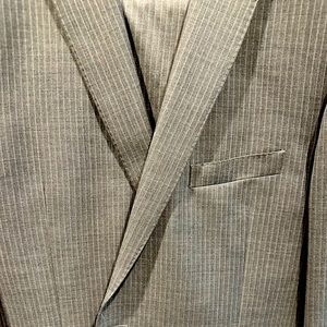 Men’s Grey striped suit saks red label